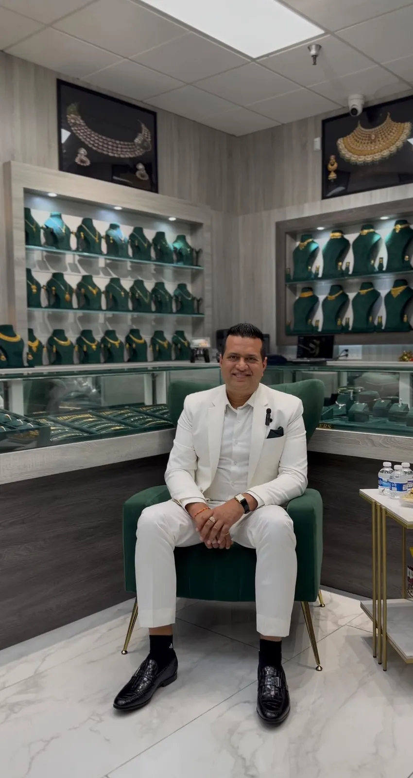 Dharam Bir Chouhan, owner of Sai Jewelers, seated in the Modesto showroom